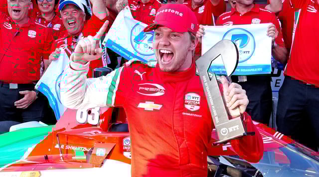 IndyCar driver Robert Shwartzman poses for a group photo with his team after winning the pole award as the fastest qualifier for the 109th running of the Indianapolis 500 on May 18, 2025, at the Indianapolis Motor Speedway in Indianapolis, Indiana. (Brian Spurlock/Icon Sportswire via Getty Images)
