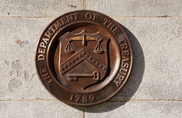 A bronze seal for the Department of the Treasury is shown at the U.S. Treasury building in Washington, U.S., January 20, 2023.  REUTERS/Kevin Lamarque/File Photo