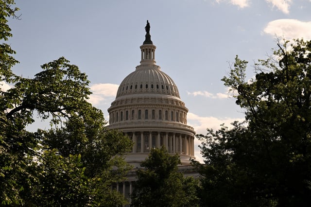 Sunlight shines on the U.S. Capitol as members of the House Budget Committee are set to meet in a rare Sunday night session to consider U.S. President Donald Trump's sweeping tax-cut bill, on Capitol Hill in Washington, D.C., U.S., May 18, 2025. REUTERS/Annabelle Gordon