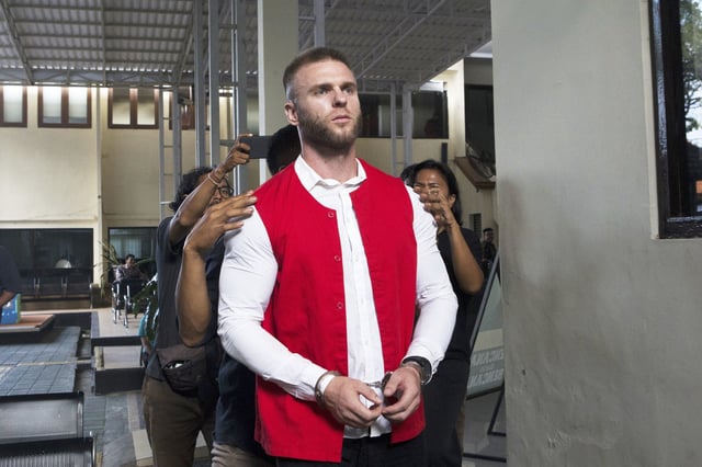 British citizen Thomas Parker who is accused of drug offenses walks to a holding cell after his trial hearing at a district court in Denpasar, Bali, Indonesia, Tuesday, May 20, 2025. (AP Photo/Firdia Lisnawati)