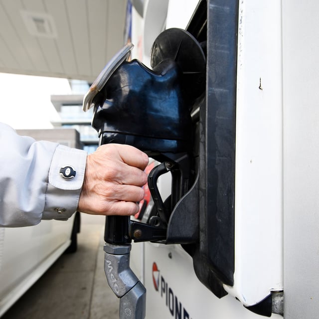 Statistics Canada data will show the impact of removing the consumer carbon price in April inflation data released Tuesday. A woman gasses up at a gas station in Mississauga, Ont., Tuesday, February 13, 2024. THE CANADIAN PRESS/Christopher Katsarov