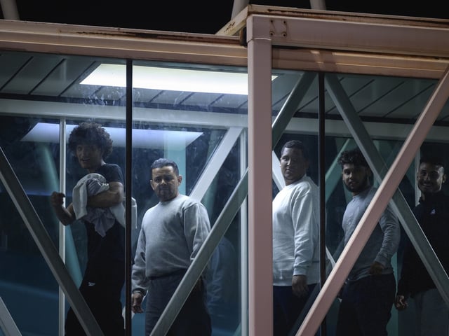 Deported individuals from the US arrive at Simon Bolivar International Airport (CCS) in Maiquetia, Vargas state, Venezuela, early on Monday, March 24, 2025. Deportation flights from the US resumed on Sunday after an agreement was reached between the two governments, according to a top Venezuelan official. Photographer: Bloomberg