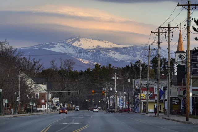 FILE - Mount Washington dominates the scene in this view of the business district in the village of North Conway, N.H., Thursday, April 13, 2023. (AP Photo/Robert F. Bukaty, File)
