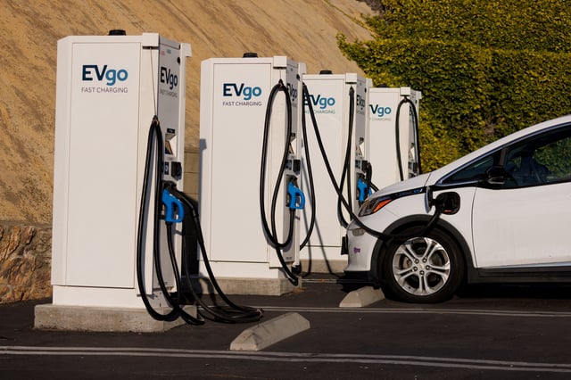 EVGO Inc. Fast electric vehicle chargers are shown charging a Chevy Bolt in Encintas, California, U.S.,October 17, 2023.     REUTERS/Mike Blake/File Photo