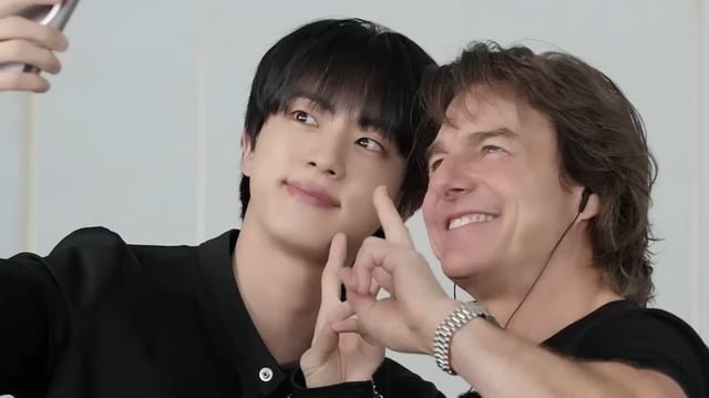 BTS' Jin takes a selfie with Hollywood star Tom Cruise.