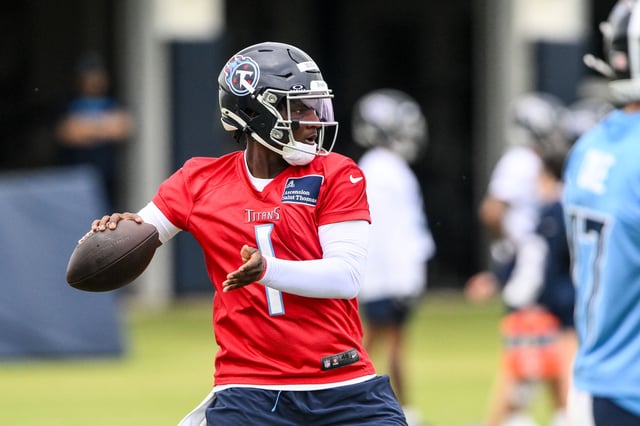 May 10, 2025; Nashville, TN, USA;  Tennessee Titans quarterback Cam Ward (1) throws a pass as he goes through drills during Rookie Mini Camp at Saint Thomas Sports Park. Mandatory Credit: Steve Roberts-Imagn Images/File Photo