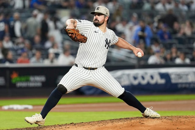 New York Yankees pitcher Carlos Rodón throws during the fourth inning of a baseball game against the New York Mets Friday, May 16, 2025, in New York. (AP Photo/Seth Wenig)