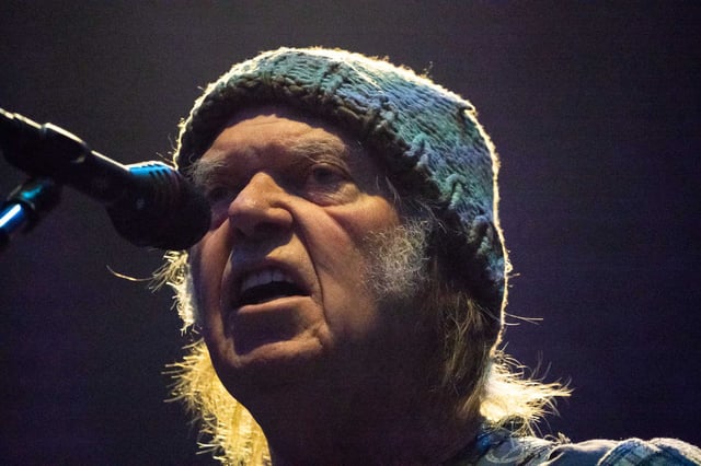 Neil Young performs at the BottleRock Festival in Napa Valley on May 25, 2019. Young has sharply escalated his criticism of Donald Trump, standing in solidarity with Bruce Springsteen and other artists who have recently come under fire from the president.