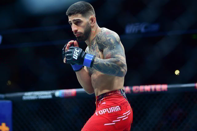 Feb 17, 2024; Anaheim, California, USA; Ilia Topuria fights against Alexander Volkanovski during UFC 298 at Honda Center. Mandatory Credit: Gary A. Vasquez-USA TODAY Sports