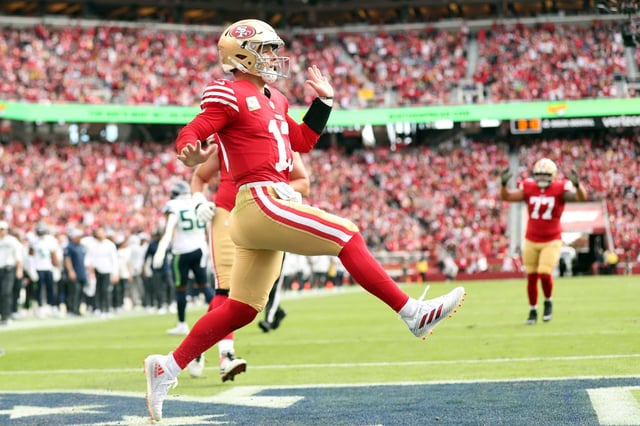 49ers QB Brock Purdy celebrates his 10-yard touchdown run against the Seattle Seahawks during an NFL game at Levi’s Stadium in Santa Clara, Calif., on Sunday, November 17, 2024.