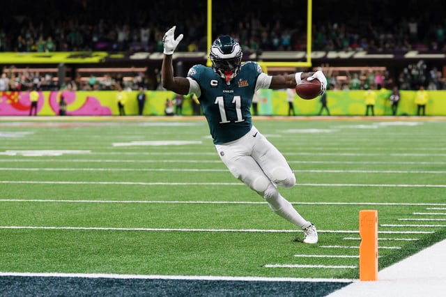 Feb 9, 2025; New Orleans, LA, USA; Philadelphia Eagles wide receiver A.J. Brown (11) scores a touchdown against the Kansas City Chiefs during the first half of Super Bowl LIX at Caesars Superdome. Mandatory Credit: Geoff Burke-Imagn Images
