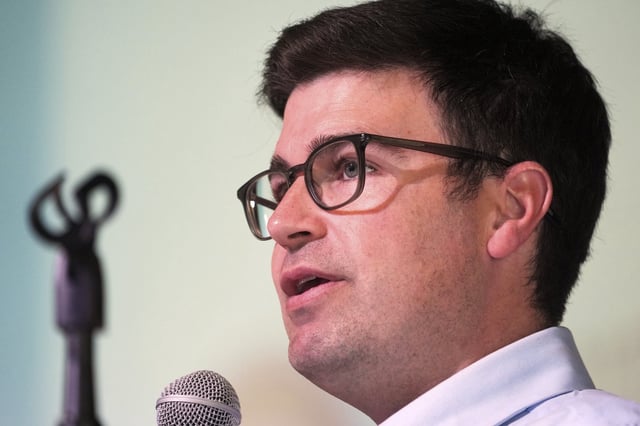FILE - Pittsburgh mayoral candidate Corey O'Connor speaks at a candidate's forum held at Perry Traditional Academy in Pittsburgh, April, 24,. 2025. (AP Photo/Gene J. Puskar, File)