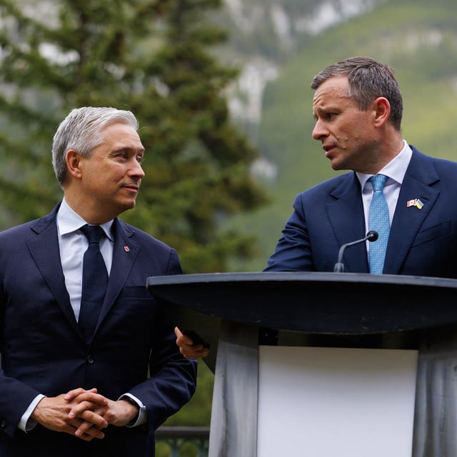 Canadian Finance Minister François-Philippe Champagne (L), and Ukrainian Finance Minister Sergii Marchenko hold a press conference during the G7 Finance Ministers and Central Bank Governors' Meeting in Banff, Alberta, Canada on May 20, 2025. Top finance leaders from the G7 nations gather in Canada starting Tuesday, with concerns including war in Ukraine at the fore while the advanced economies grapple with fallout from US President Donald Trump's sweeping tariffs. (Photo by Cole Burston/ / AFP) (Photo by COLE BURSTON//AFP via Getty Images)