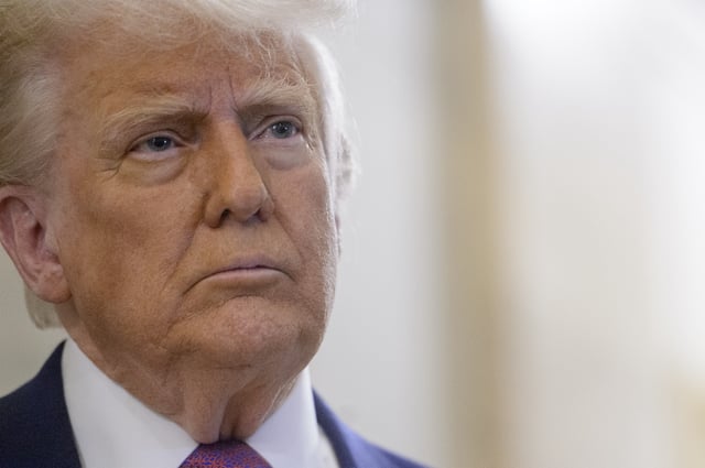 President Donald Trump speaks to reporters as he arrives for a meeting with the House Republican Conference at the Capitol, Tuesday, May 20, 2025, in Washington. (AP Photo/Rod Lamkey, Jr.)