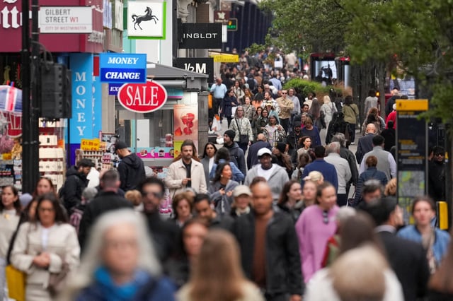 People walk on Oxford Street in London, Britain, May 15, 2025. REUTERS/Maja Smiejkowska/ File Photo