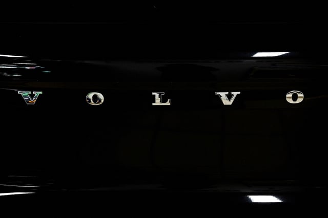 A logo of Volvo is seen inside a car dealer in Nijmegen, Netherlands February 26, 2025. REUTERS/Piroschka van de Wouw/File Photo