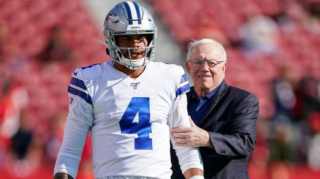 Dallas Cowboys quarterback Dak Prescott (4) and owner Jerry Jones (right).