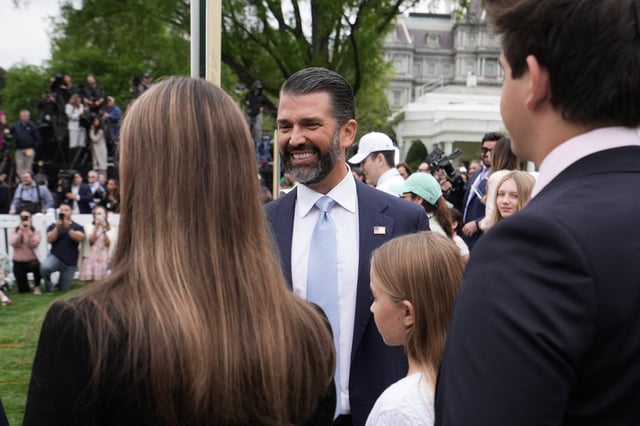 Donald Trump Jr. attends the annual White House Easter Egg Roll event, on the South Lawn of the White House in Washington, D.C., U.S., April 21, 2025. REUTERS/Ken Cedeno/File Photo