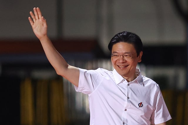 Singapore's Prime Minister Lawrence Wong arrives at an assembly area for People's Action Party supporters, on the day of the general election in Singapore, May 3, 2025. REUTERS/Edgar Su/File Photo