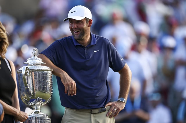 Scottie Scheffler of the United States celebrates with the Wanamaker Trophy after winning the 2025 PGA Championship at Quail Hollow Country Club on May 18, 2025 in Charlotte, North Carolina.
