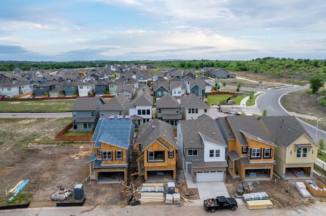 An aerial view of houses undergoing construction in a neighborhood on April 17, 2025, in Austin, Texas.