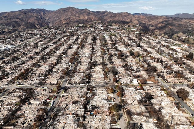 Some 1,600 insurance policies for Pacific Palisades homes were dropped by State Farm in July, six months before fires wiped out much of the community. Above, Pacific Palisades, on Feb. 5, 2025. (AP Photo/Jae C. Hong, File)