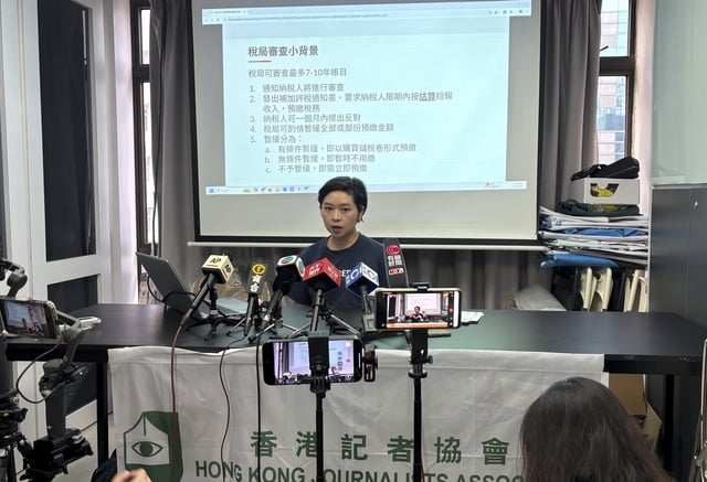Hong Kong Journalists Association chairperson Selina Cheng holds a press conference on journalists and their families being targeted by tax audits without sufficient evidence in Wan Chai, Hong Kong, Wednesday, May 21, 2025. (AP Photo/Kanis Leung)