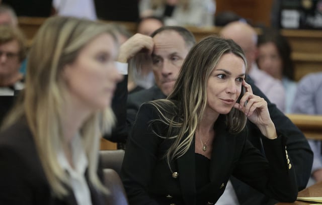 After the jury was dismissed for the day, Karen Read listens as Canton Police Sergeant Michael Lank is questioned by defense attorney Alan Jackson. She is flanked by attorneys Elizabeth Little and David Yannetti. (Photo by Pat Greenhouse/The Boston Globe via Getty Images)