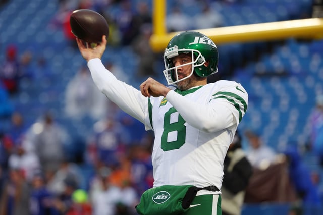 Quarterback Aaron Rodgers #8 of the New York Jets warms up prior to a game against the Buffalo Bills at Highmark Stadium on December 29, 2024 in Orchard Park, New York.