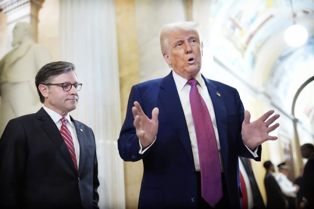 With Speaker of the House Mike Johnson (R-LA) by his side President Donald Trump speaks to the press following a House Republican meeting at the U.S. Capitol on May 20, 2025 in Washington, DC. Trump will joined conservative House lawmakers to help push through their budget bill after it advanced through the House Budget Committee on Sunday evening.  (Photo by Kevin Dietsch/Getty Images)
