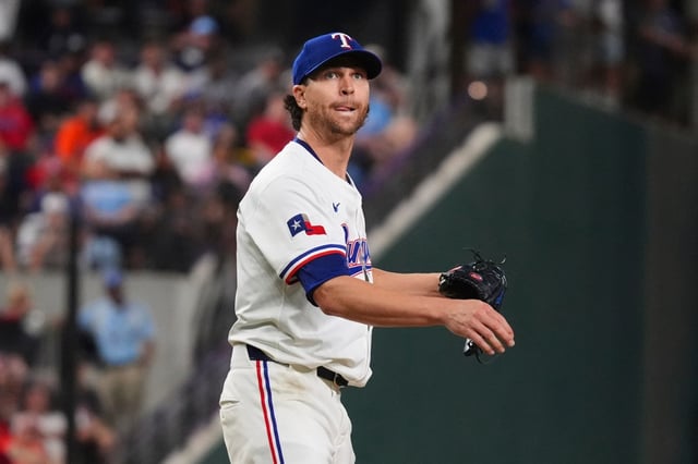 Texas Rangers starting pitcher Jacob deGrom watches a hit ball go foul during the seventh inning of a baseball game against the Houston Astros, Thursday, May 15, 2025, in Arlington, Texas. (AP Photo/LM Otero)