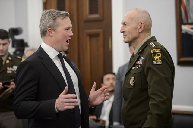 Daniel Driscoll, Secretary, Department of the Army, left, talks with General Randy George, Chief of Staff, United States Army prior to their testimony during a House Committee on Appropriations, Subcommittee on Defense oversight hearing on the United States Army at the Capitol, Wednesday, May 7, 2025, in Washington.