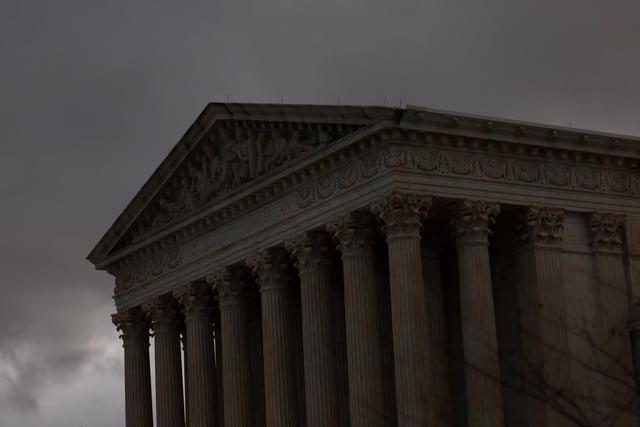 The sun sets on the U.S. Supreme Court building after a stormy day in Washington, U.S., November 11, 2022. REUTERS/Leah Millis/File Photo