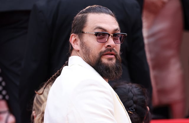 Jason Momoa attends the &#34;Highest 2 Lowest&#34; red carpet at the 78th annual Cannes Film Festival at Palais des Festivals on May 19, 2025 in Cannes, France.