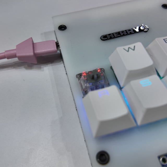 A Cherry IK key switch on display at Computex 2025 within a test keyboard pad. 