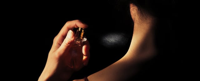 applying perfume