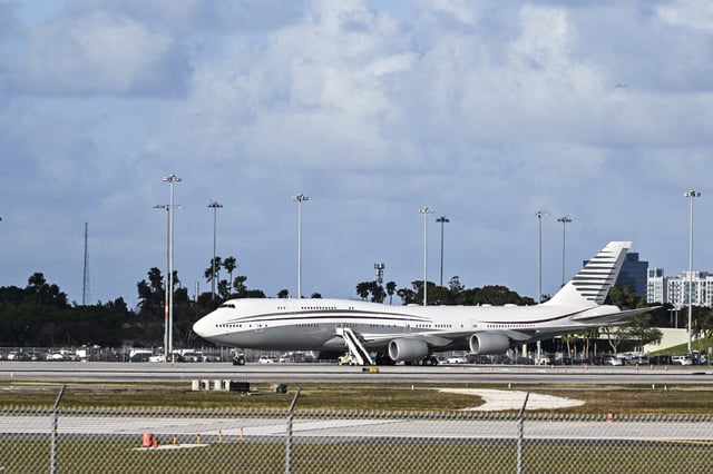 A Boeing 747 sits on the tarmac of Palm Beach International airport after President Donald Trump toured the aircraft on Feb. 15, 2025.