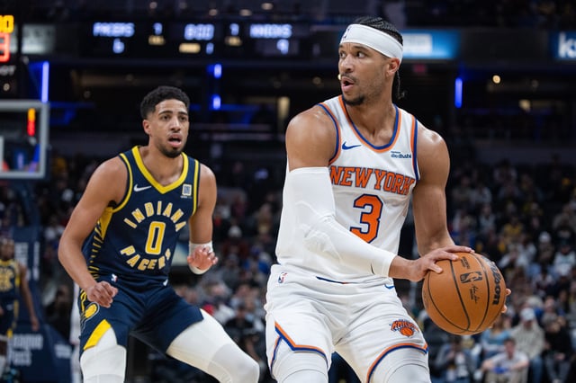 New York Knicks guard Josh Hart (3) holds the ball while Indiana Pacers guard Tyrese Haliburton (0) defends in the first half at Gainbridge Fieldhouse.
