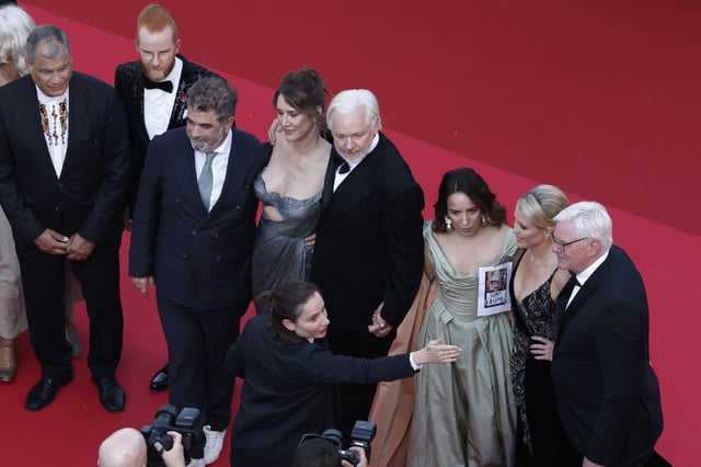 WikiLeaks founder Julian Assange, his wife Stella Assange, and the team of the documentary film "The Six Billion Dollar Man" presented as part of Special Screenings, pose on the red carpet during arrivals for the screening of the film "The History of Sound" in competition at the 78th Cannes Film Festival in Cannes, France, May 21, 2025. REUTERS/Benoit Tessier