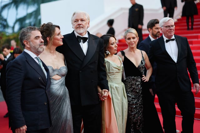 WikiLeaks founder Julian Assange, his wife Stella Assange, and the team of the documentary film "The Six Billion Dollar Man" presented as part of Special Screenings pose on the red carpet during arrivals for the screening of the film "The History of Sound" in competition at the 78th Cannes Film Festival in Cannes, France, May 21, 2025. REUTERS/Stephane Mahe