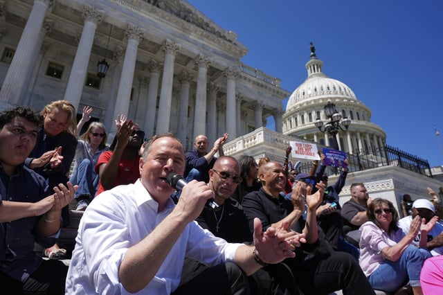 Sen. Adam Schiff, D-Calif., from left, speaks as House Minority Leader Hakeem Jeffries, D-N.Y., and Sen. Cory Booker D-N.J., listen during a live-streamed conversation on the steps of the Capitol, Sunday, April 27, 2025, in Washington. (AP Photo/Manuel Balce Ceneta)
