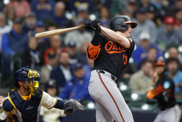 Baltimore Orioles&#39; Heston Kjerstad watches his run-scoring double against the Milwaukee Brewers during the eighth inning of a baseball game, Wednesday, May 21, 2025, in Milwaukee. (AP Photo/Jeffrey Phelps)