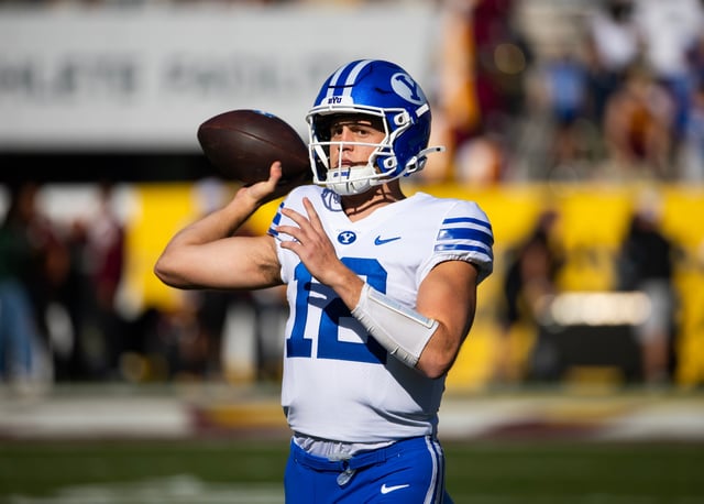 Brigham Young Cougars quarterback Jake Retzlaff (12) against the Arizona State Sun Devils at Mountain America Stadium.