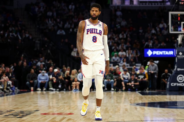 Paul George #8 of the Philadelphia 76ers looks on against the Minnesota Timberwolves in the first quarter at Target Center on March 04, 2025 in Minneapolis, Minnesota.