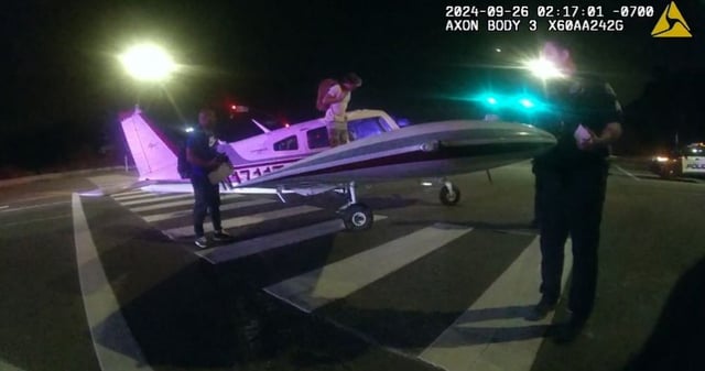 Police body-worn camera footage shows Troy Smith, left, and his flight instructor after they made an early-morning emergency landing Sept. 26, 2024, in Oceanside. Smith later admitted he had a brick of cocaine in his backpack. He was sentenced to federal prison Wednesday for two counts of possessing cocaine with intent to distribute. (U.S. District Court filing)