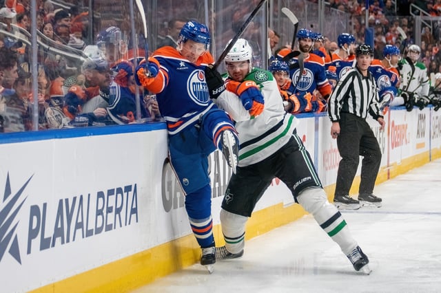 Lian Bichsel #6 of the Dallas Stars collides with Jeff Skinner #53 of the Edmonton Oilers during the game at Rogers Place on March 26, 2025 in Edmonton, Canada.