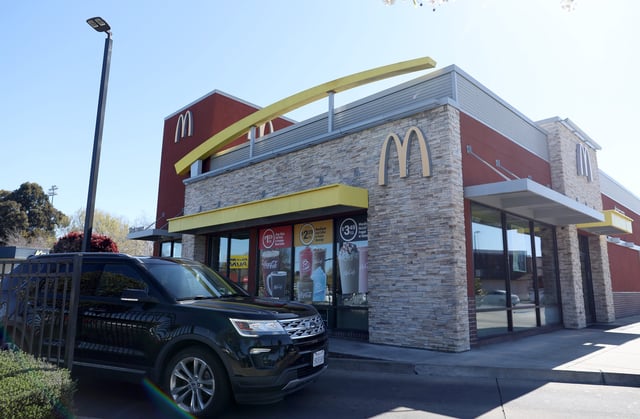 A car goes through the drive-thru at a McDonald's restaurant on April 3, 2023 in San Pablo, California.