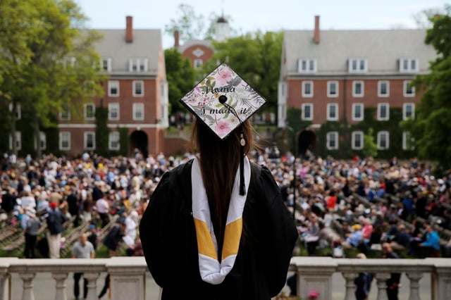 Smith College 2017 graduate Kayla Ray Madison has "Mama I Made It" written on her cap as she waits to graduate during commencement in Northampton, Massachusetts on May 21, 2017.