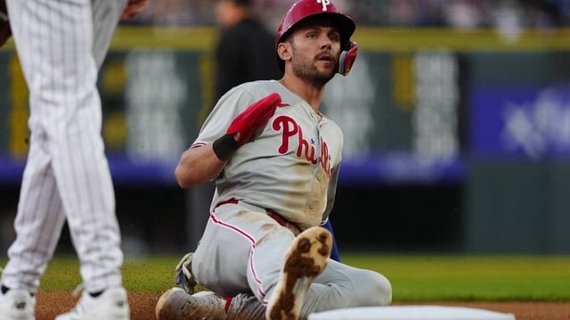 May 21, 2025; Denver, Colorado, USA; Philadelphia Phillies shortstop Trea Turner (7) advances to third in the fourth inning against the Colorado Rockies at Coors Field. Mandatory Credit: Ron Chenoy-Imagn Images
