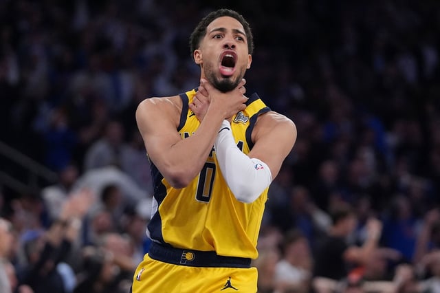 Haliburton did Reggie Miller's infamous choke gesture to the New York crowd following the game-tying shot.